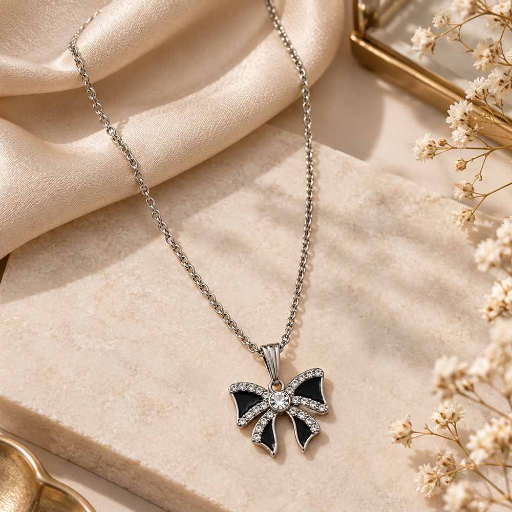 The99Jewel Glamorous Silver Plated Austrian Stone Bow Pendant Jewellery for Women