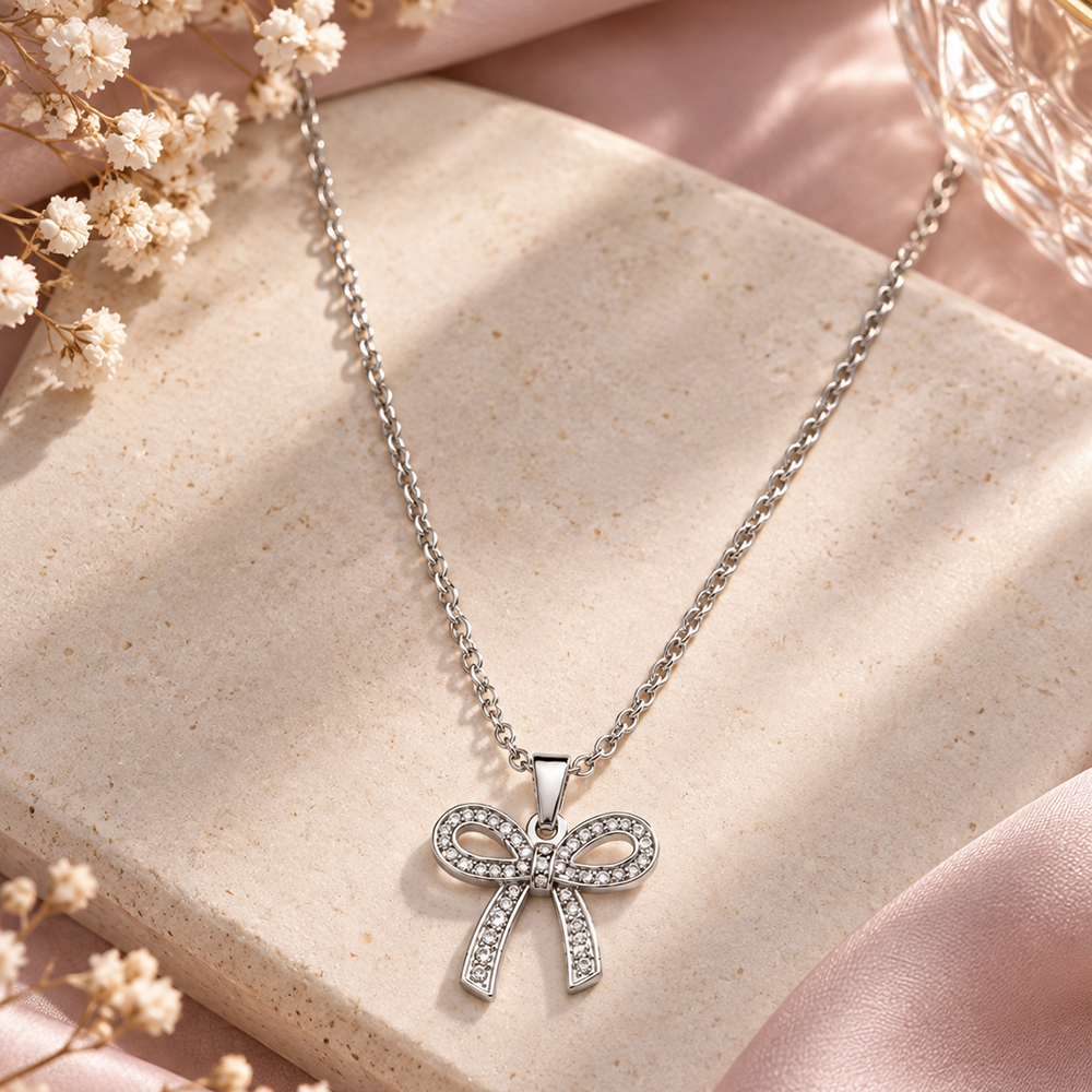 The99Jewel Glamorous Silver Plated Austrian Stone Bow Pendant Jewellery for Women