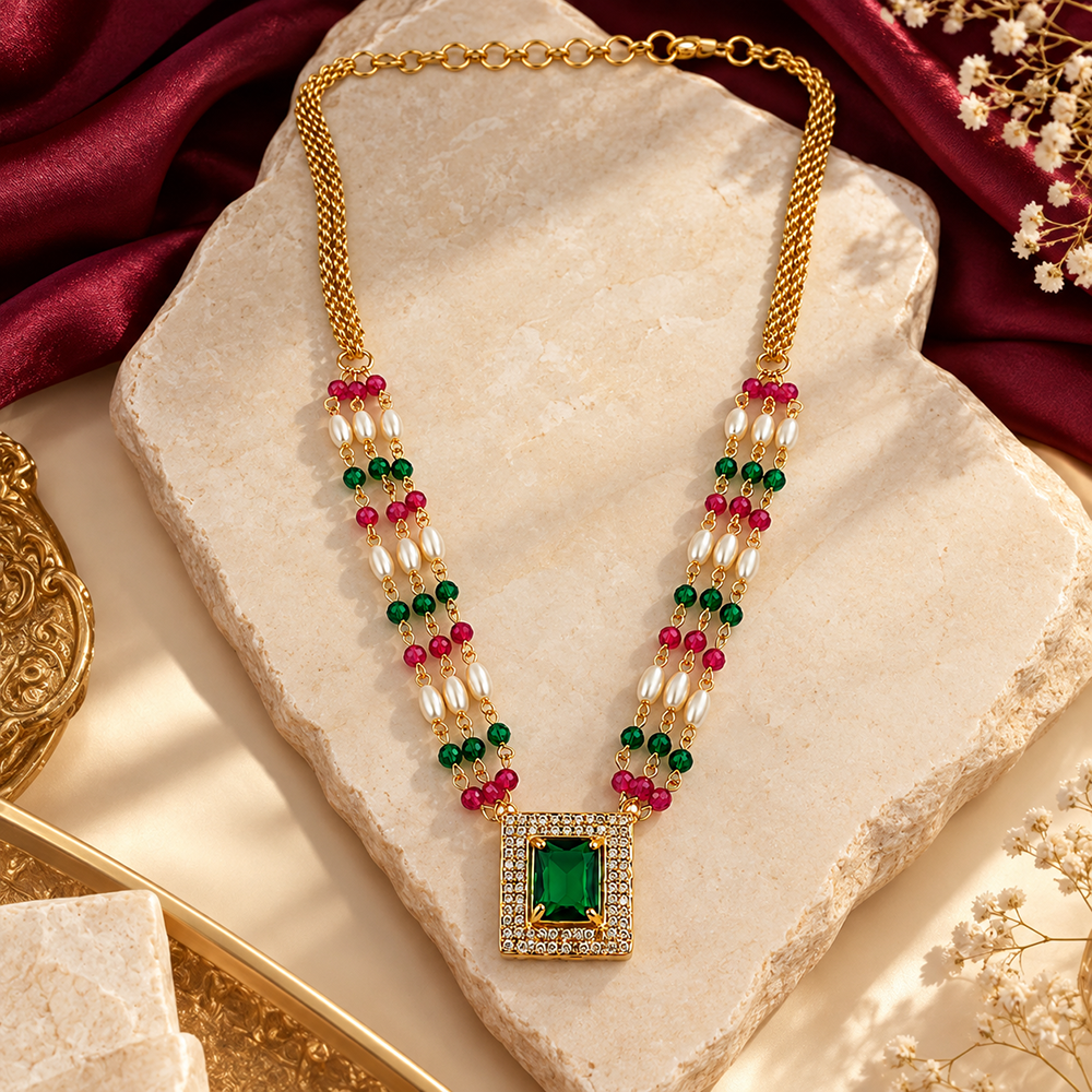 The99Jewel Pearl and Gold Beaded Necklace with Ruby and Emerald-Coloured Stone Accents