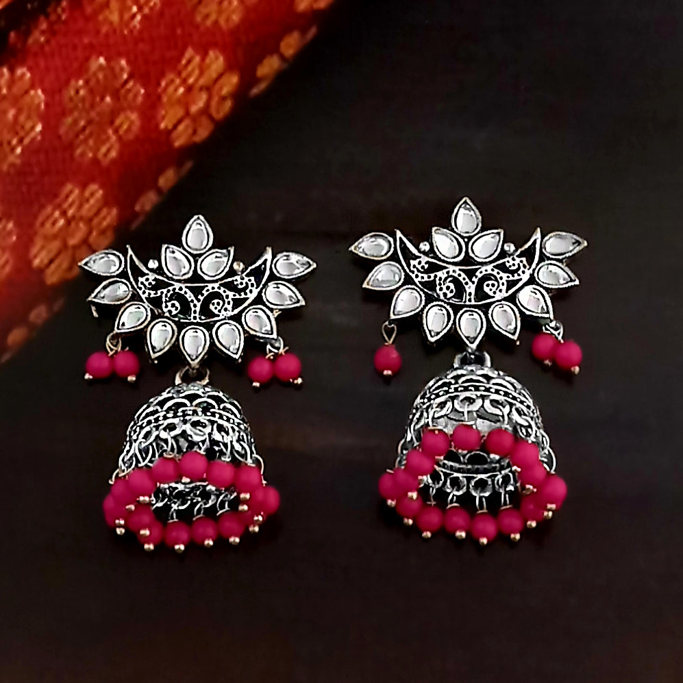 The99Jewel Oxidised Plated Jhumka Earrings With Pink Beads