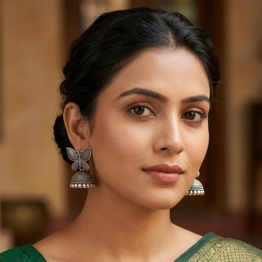The99Jewel Antique-Inspired Oxidised Plated Jhumki Earrings With Butterfly Motif Jewellery for Women