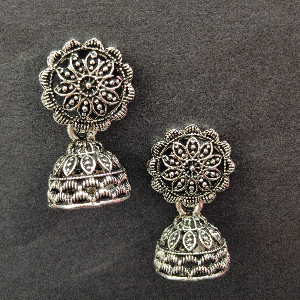 The99Jewel Antique-Inspired Oxidised Plated Jhumki Earrings With Floral Motif Jewellery for Women
