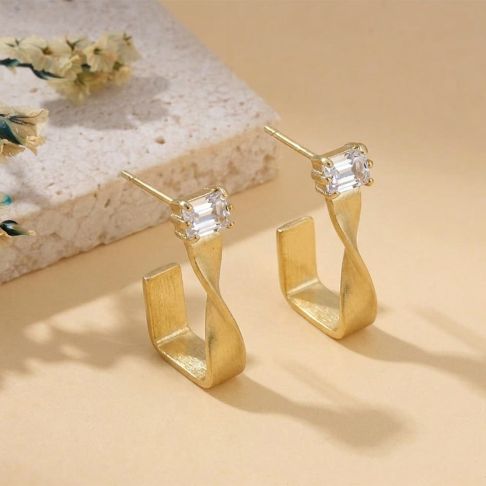 The99Jewel Gold Plated Austrian Stone Twisted Shape Earrings