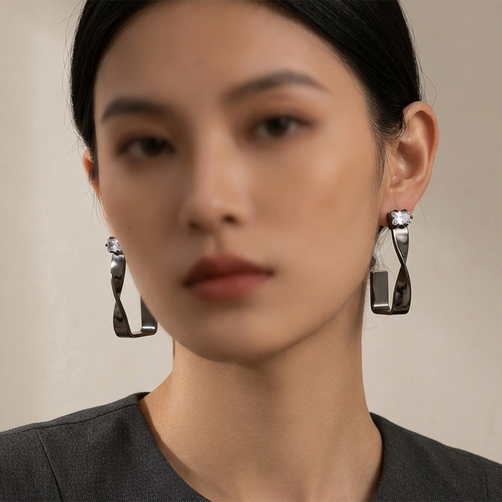 The99Jewel Black Plated Austrian Stone Twisted Shape Earrings