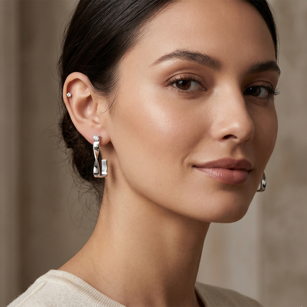 The99Jewel Silver Plated Austrian Stone Twisted Shape Earrings
