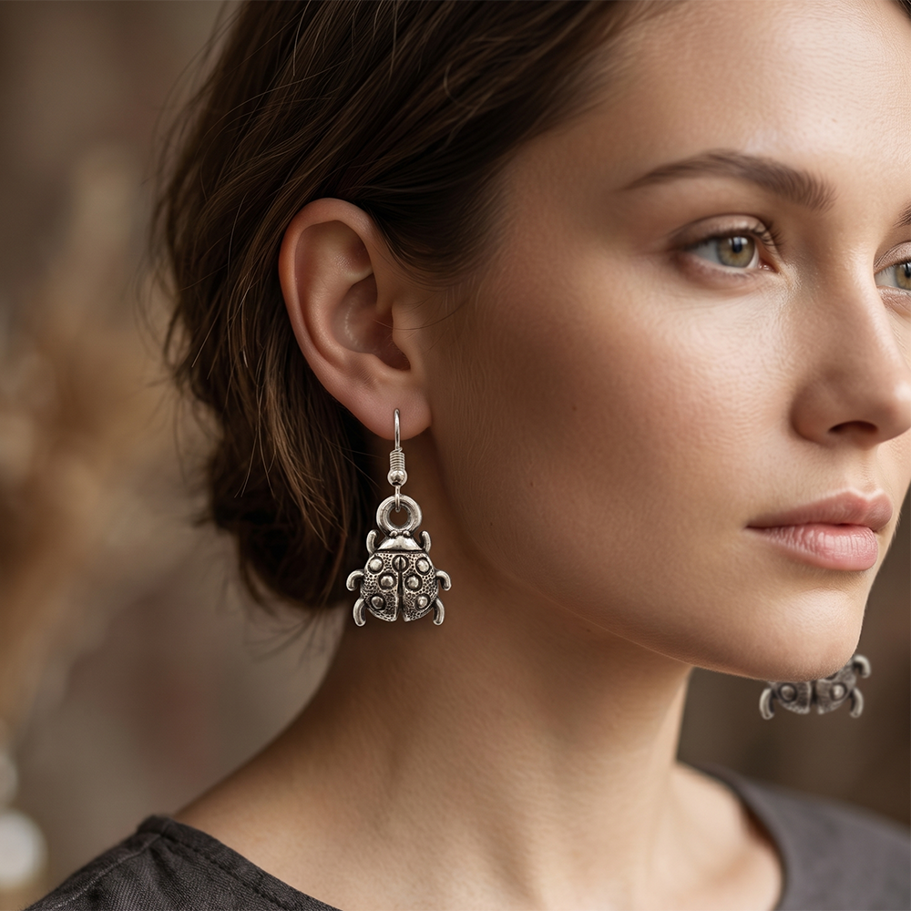 The99Jewel  Modern  Silver-Toned  Betal Shape  Earrings for Women 