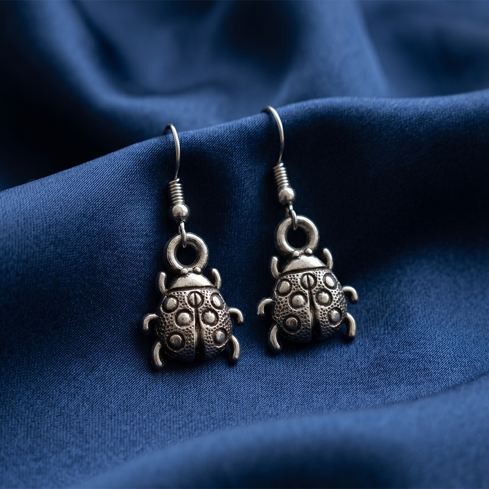 The99Jewel  Modern  Silver-Toned  Betal Shape  Earrings for Women