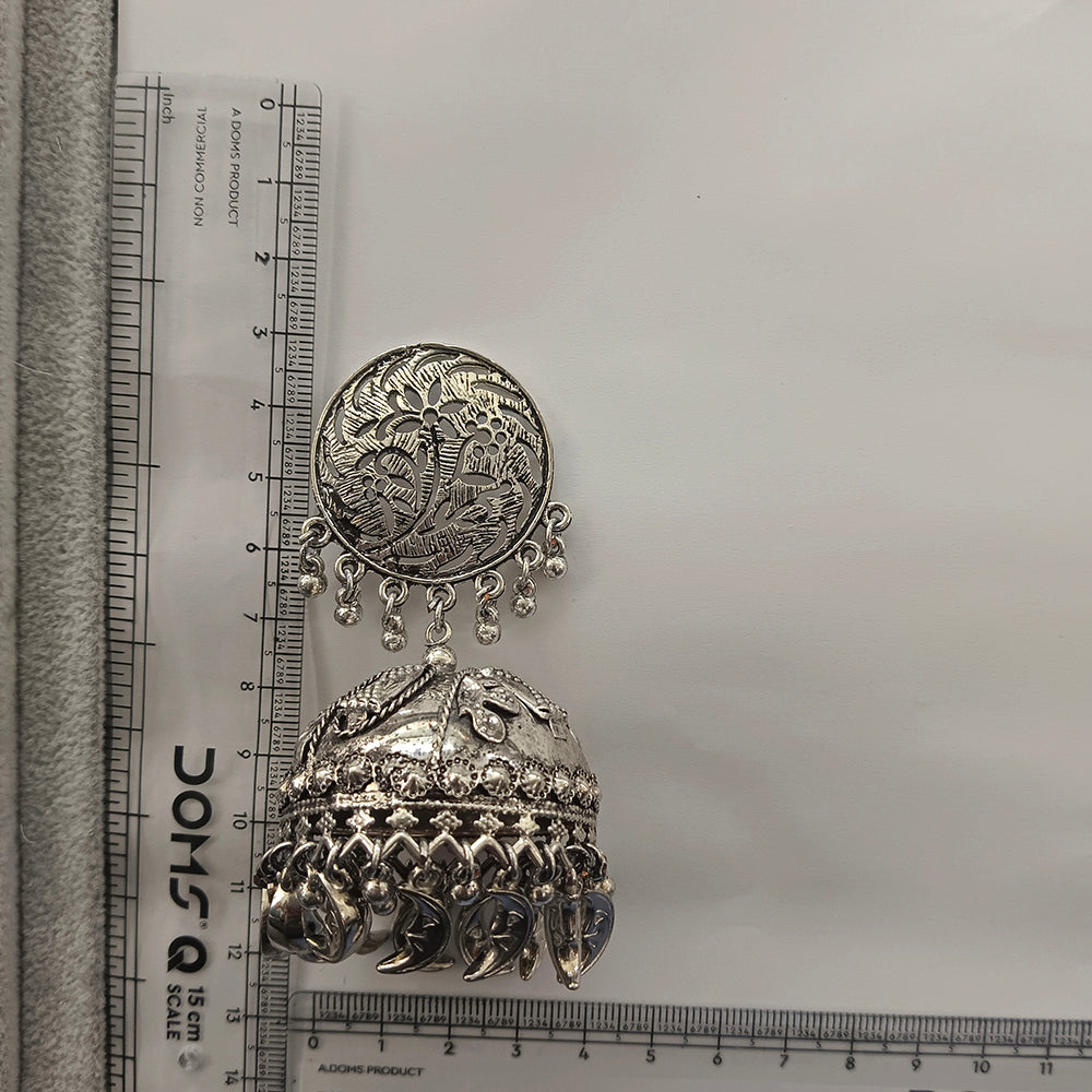 The99Jewel These oxidised silver jhumka earrings feature a floral stud for Women