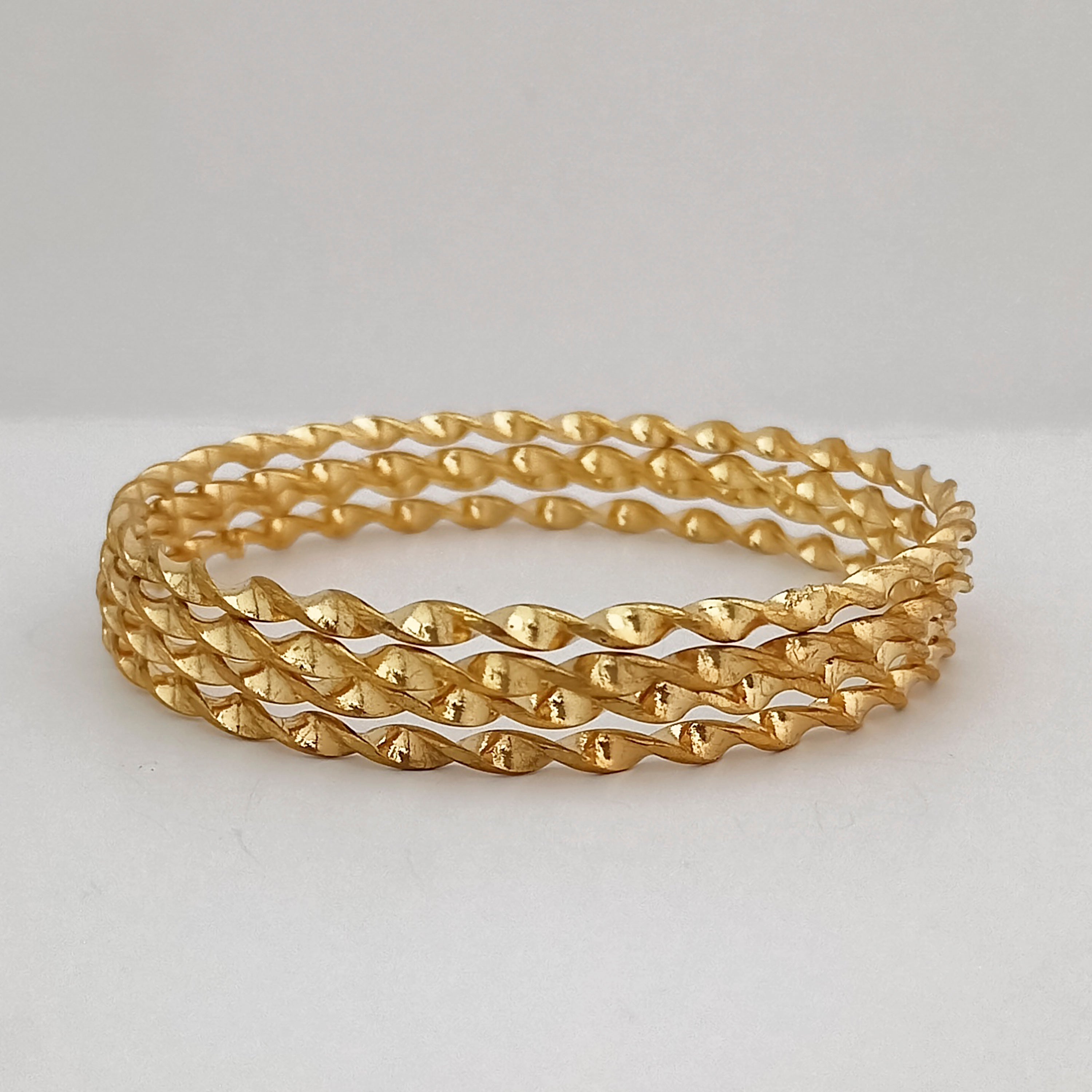 The99Jewel Gold Plated Twisted Designer Bangles Set for Women (4 Piece In a set )