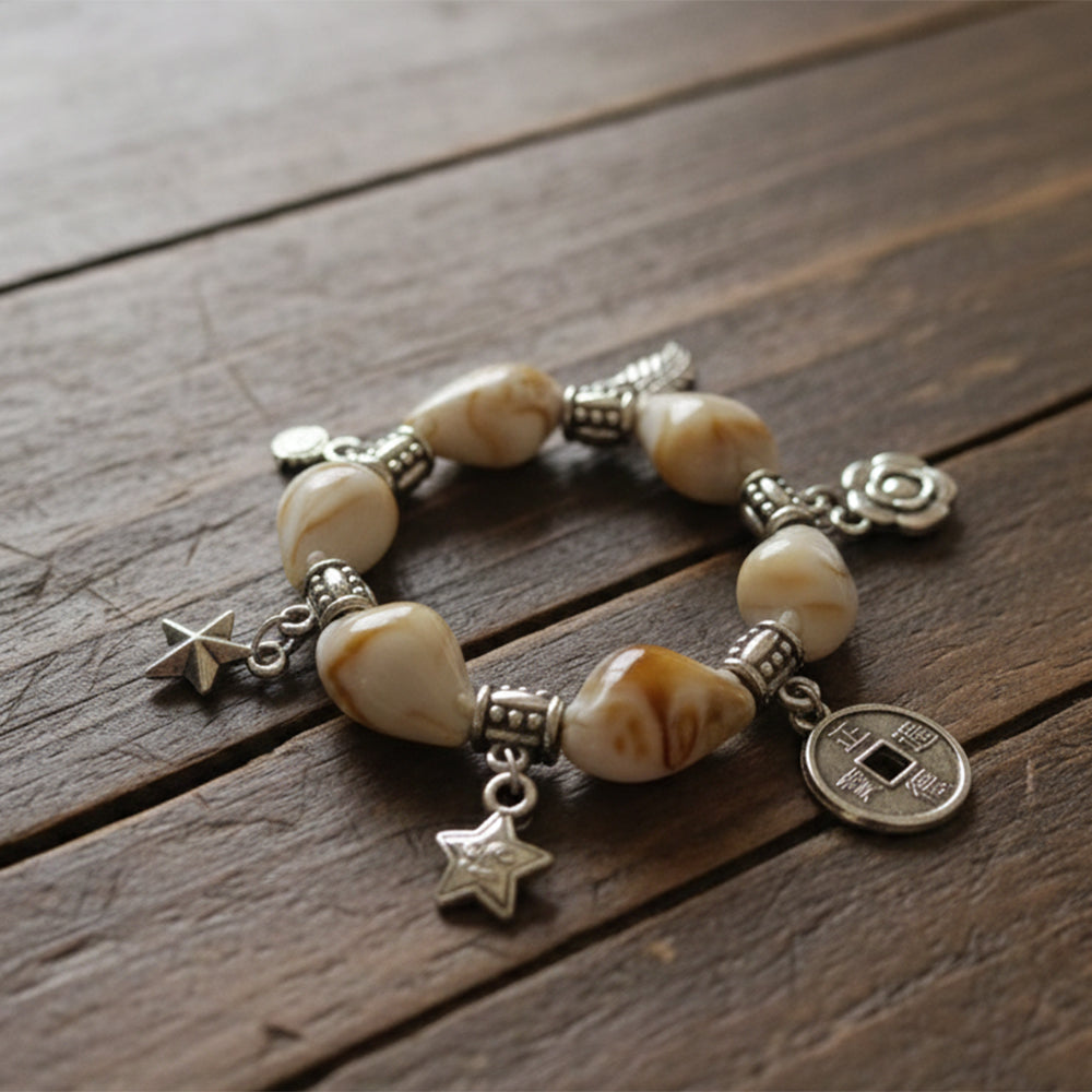 Thee99Jewel Stylish Stretchable Shell With Charms Bracelet