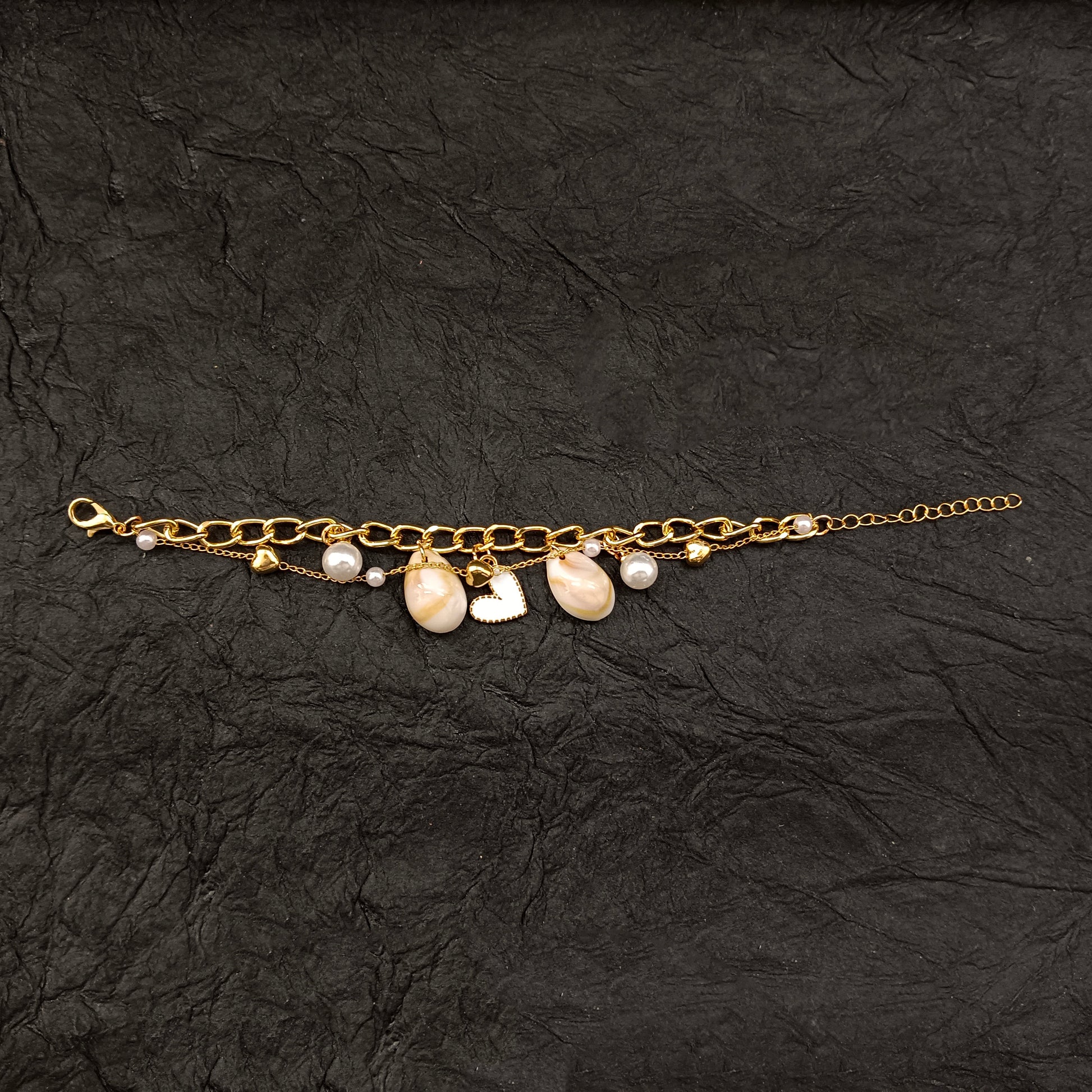 The99Jewel Gold Plated Heart And Shell Stylish Bracelets