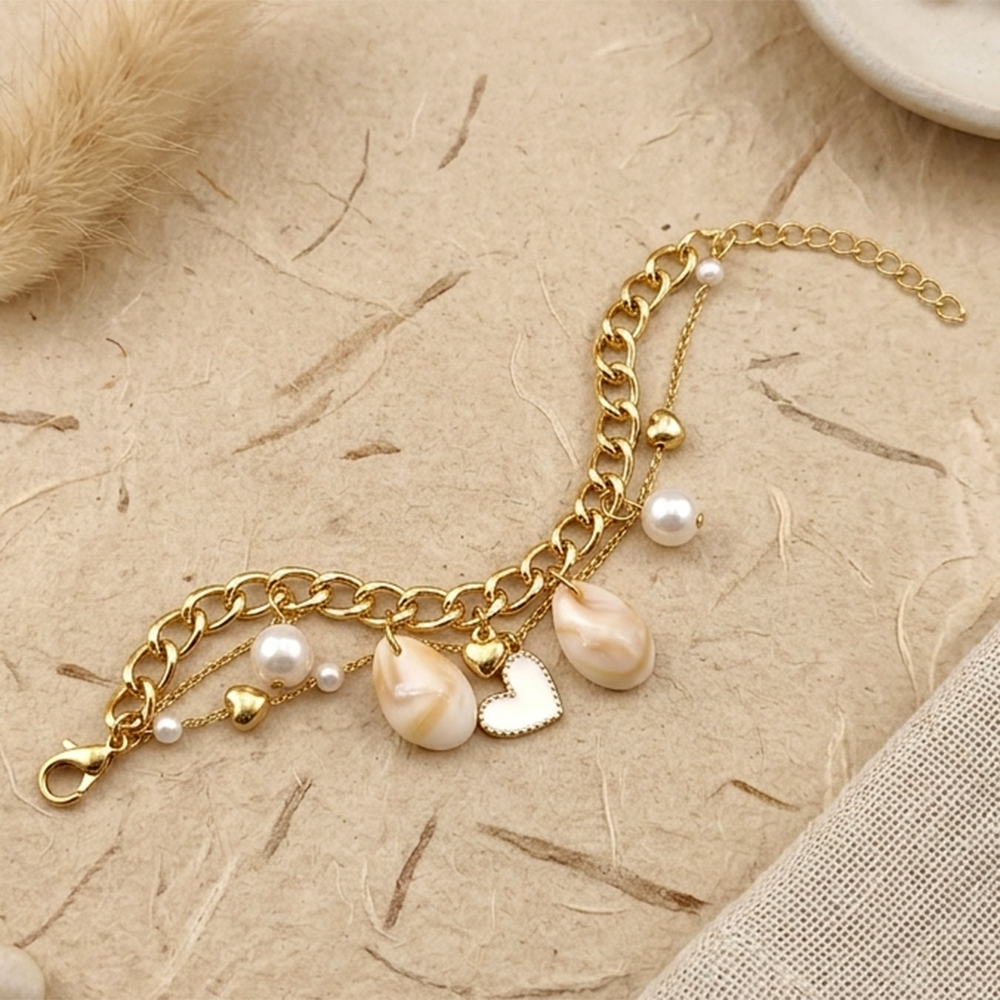 The99Jewel Gold Plated Heart And Shell Stylish Bracelets