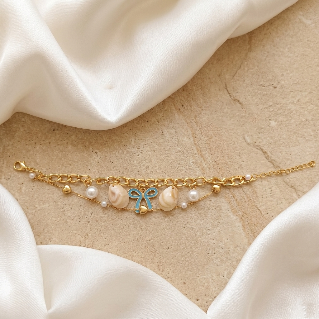 The99Jewel Gold Plated Light Blue Bow And Shell Stylish Bracelets