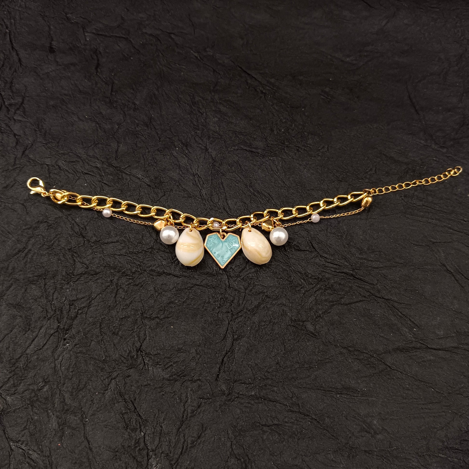 The99Jewel Gold Plated Light Blue Heart And Shell Stylish Bracelets