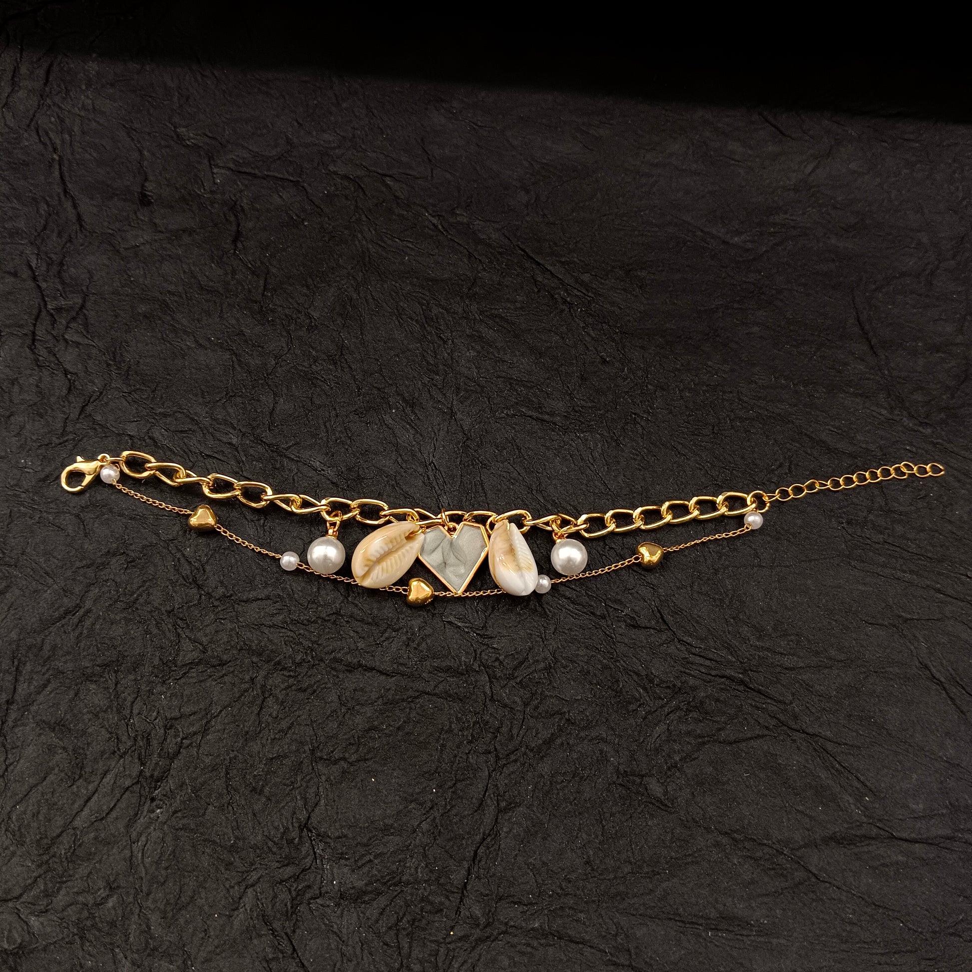 The99Jewel Gold Plated Grey Heart And Shell Stylish Bracelets