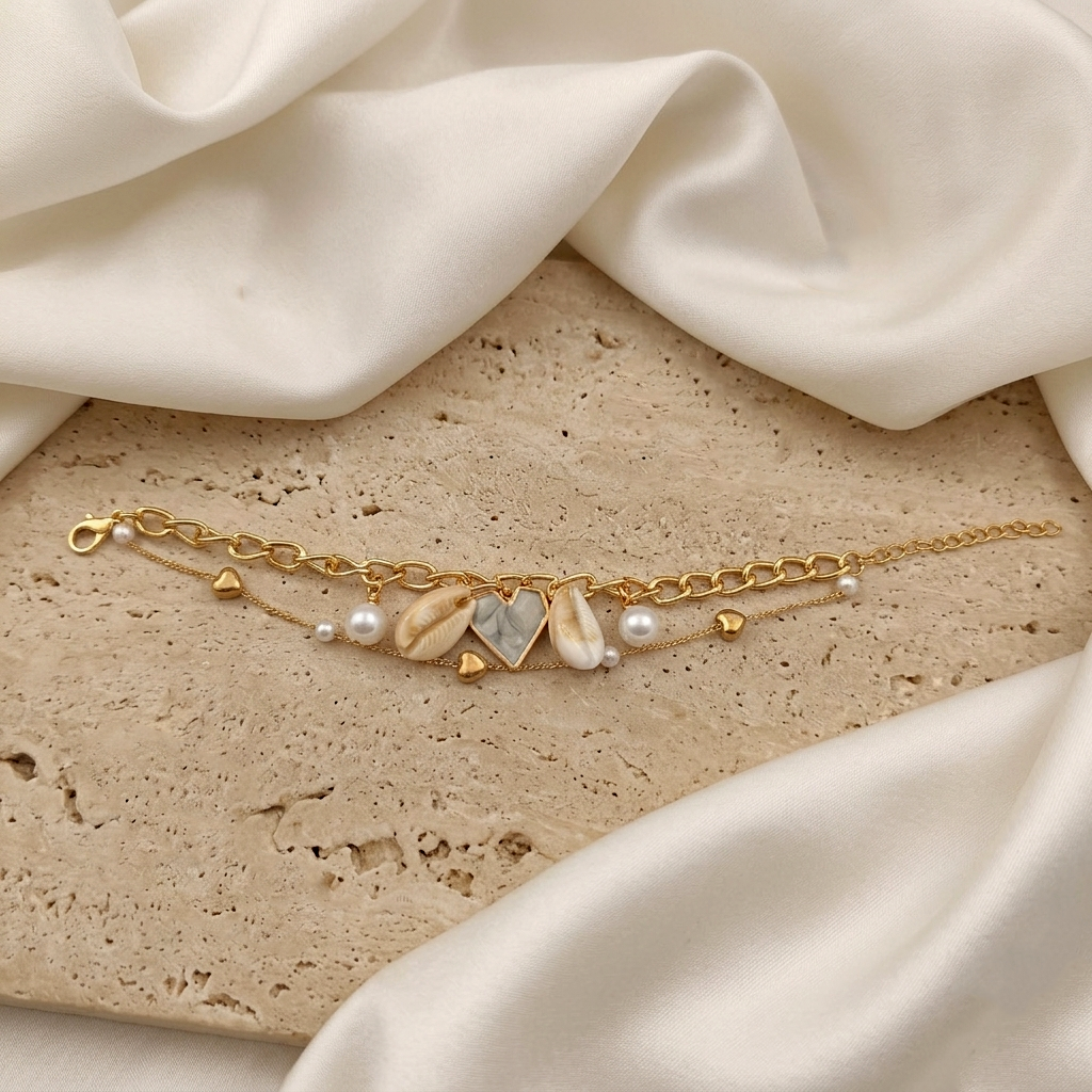 The99Jewel Gold Plated Grey Heart And Shell Stylish Bracelets