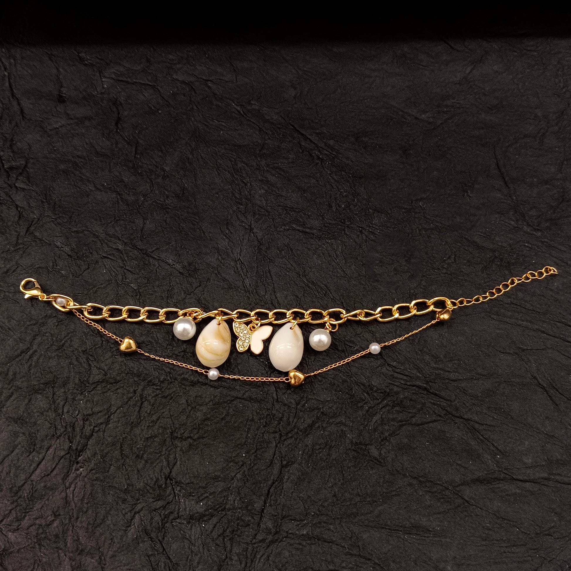 The99Jewel Gold Plated White ButterflyAnd Shell Stylish Bracelets