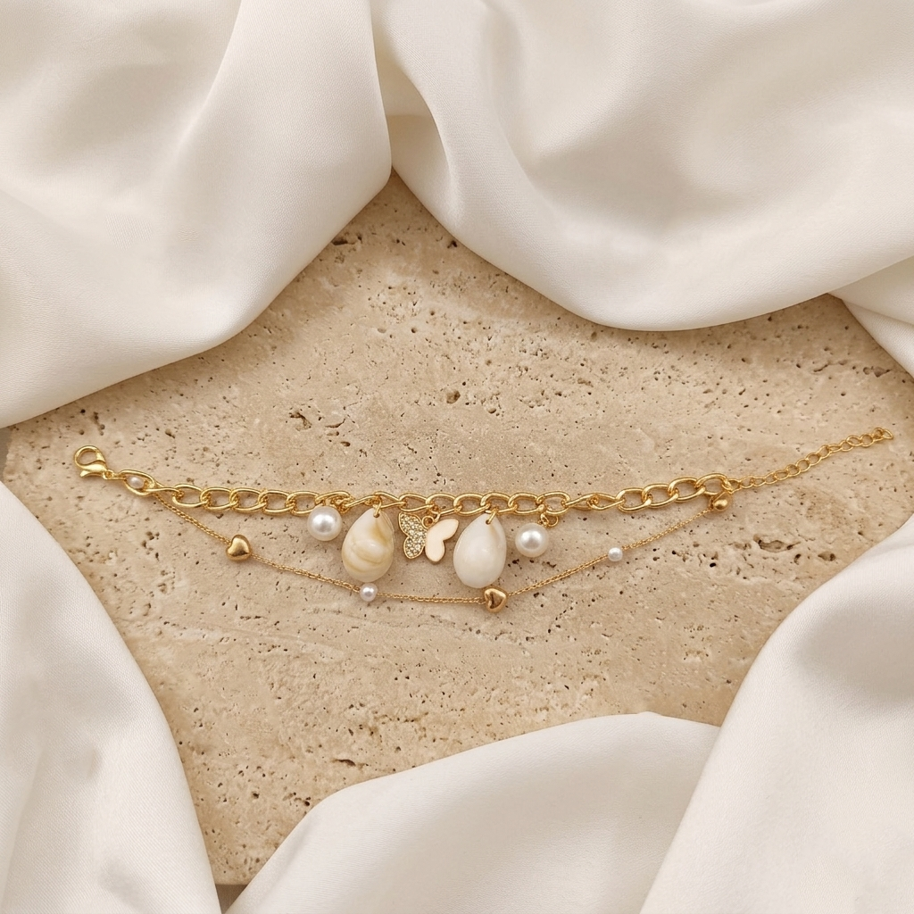 The99Jewel Gold Plated White ButterflyAnd Shell Stylish Bracelets