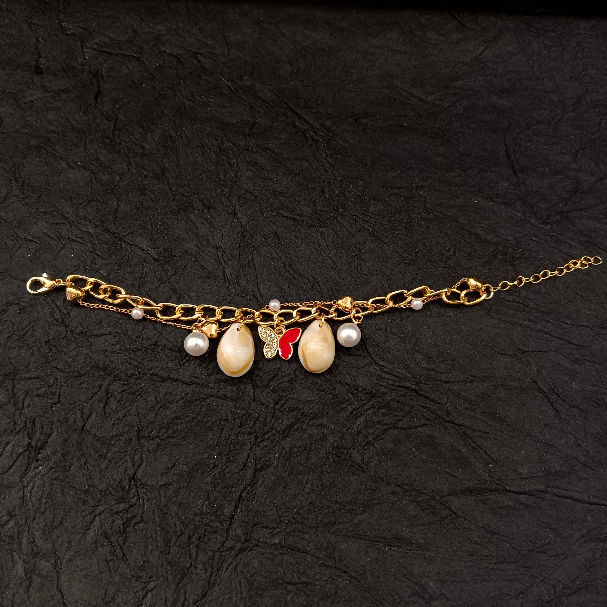 The99Jewel Gold Plated Red ButterflyAnd Shell Stylish Bracelets