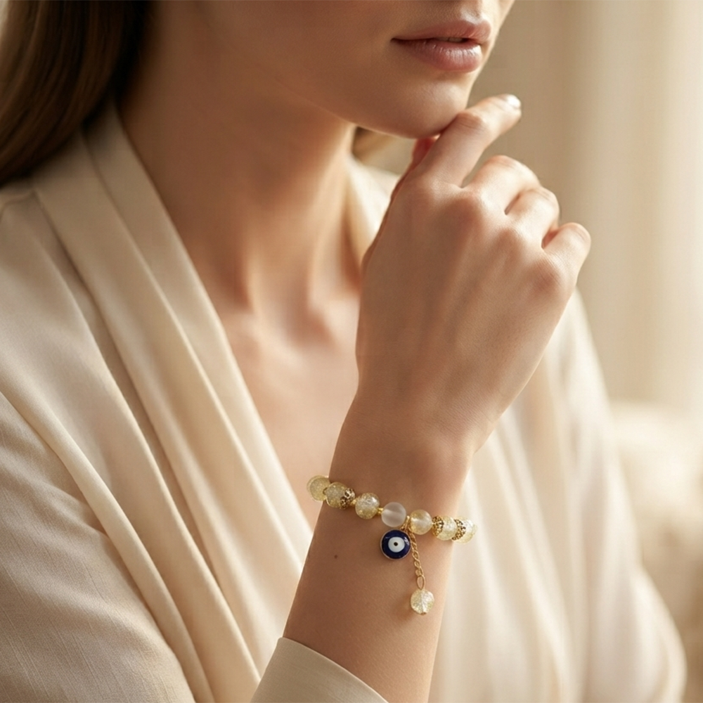 The99Jewel Crackle Beads Bracelet with Evil Eye Charm and Gold Toned Metal accents for women