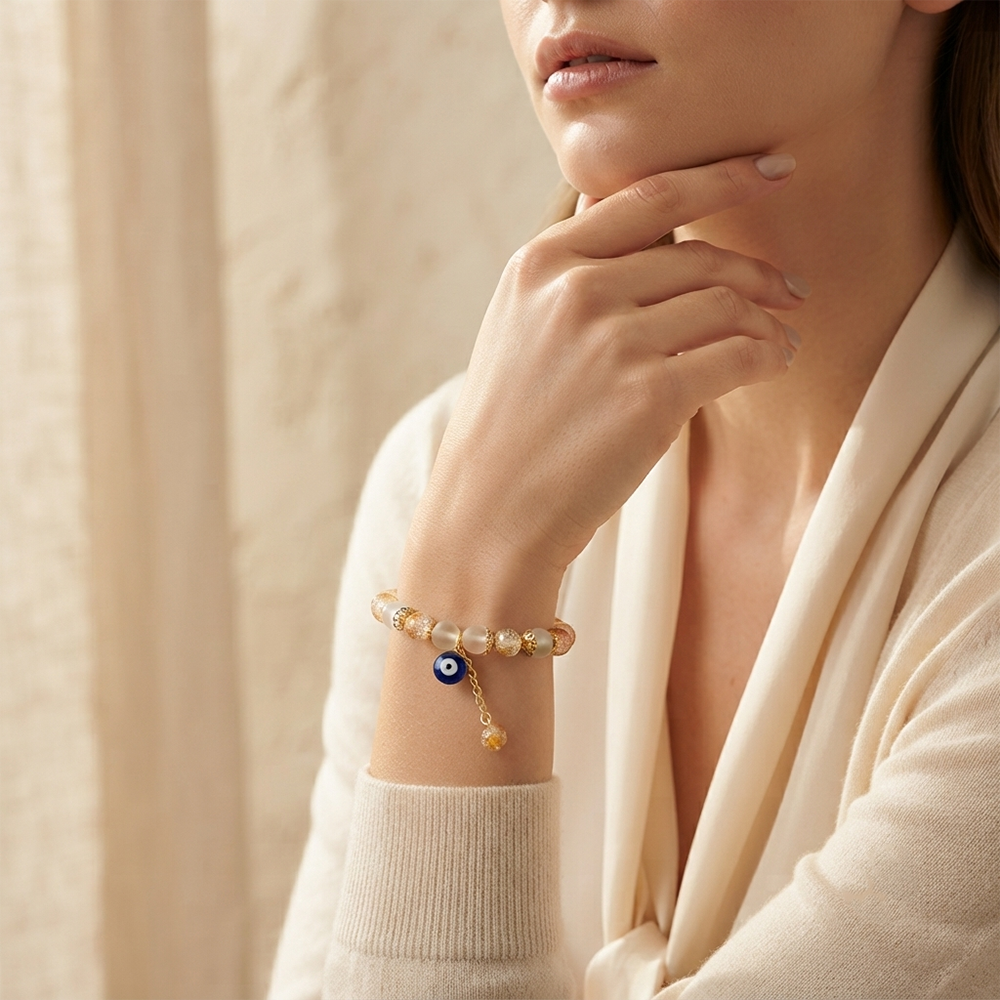 The99Jewel Crackle Beads Bracelet with Evil Eye Charm and Gold Toned Metal accents for women