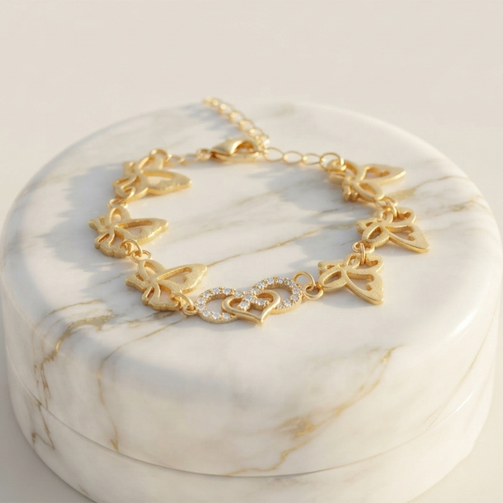 The99Jewel Graceful Gold Plated Austrian Stone Adjustable Bracelet with Heart & ButterflyShape Charm