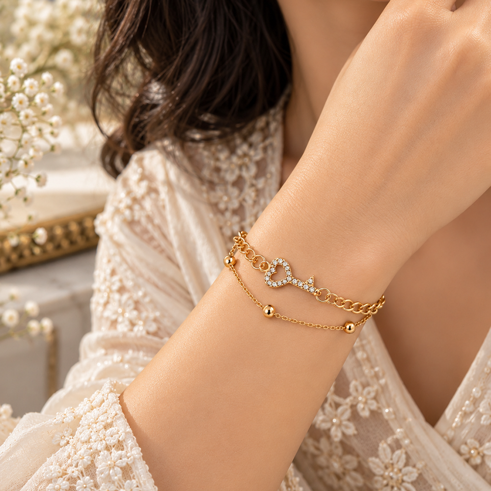 The99Jewel Rose Gold Plated Austrian Stone Key Charm Adjustable Chain Bracelet
