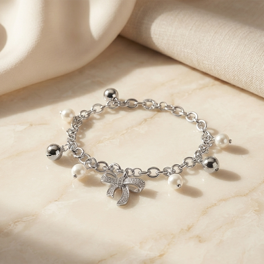 The99Jewel Fashionable Silver Plated With Bow Shape Charm Bracelet with Pearl Drops
