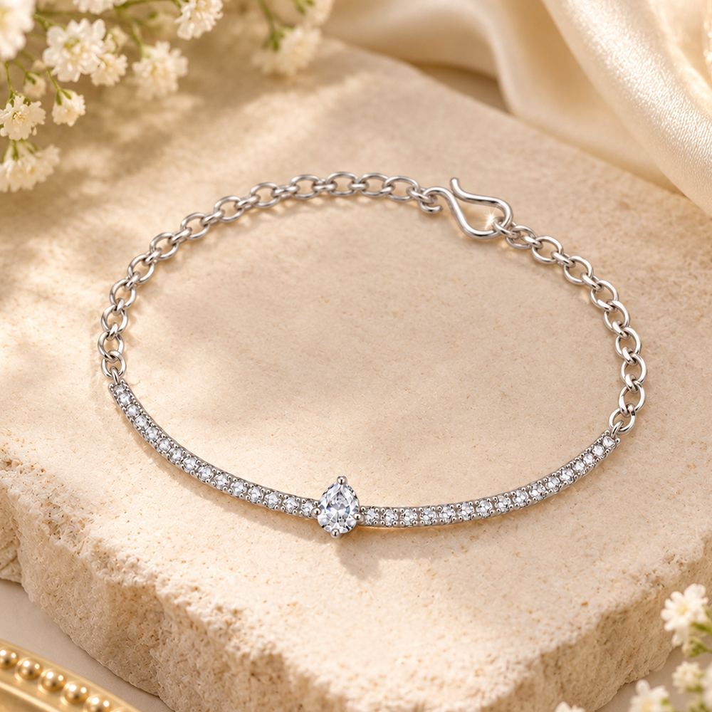 The99Jewel Everglow Silver Plated Tear Drop Shape American Diamond Fashion Bracelet for Women